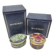 Two Moorcroft enamel boxes