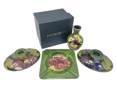 Pair of Moorcroft candlestick holders in Clematis pattern