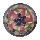 Moorcroft charger decorated in Pomegranate pattern