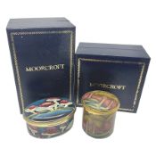 Two Moorcroft enamel boxes