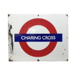 Enamel station sign for Charing Cross in red and blue on a white ground 56 x 71cm with hanging brack