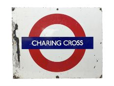 Enamel station sign for Charing Cross in red and blue on a white ground 56 x 71cm with hanging brack