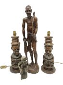Pair of 20th century carved wood table lamp with African busts and figures