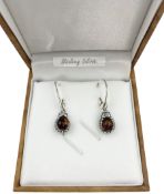 Pair of silver Baltic amber hedgehog pendant earrings