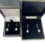 Pair of silver-gilt opal pendant earrings