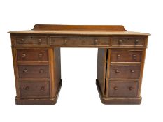 Late 19th century mahogany twin pedestal desk