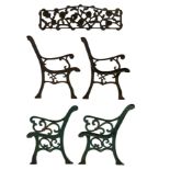 Pair cast iron garden bench ends decorated with scrolling design (H83cm)