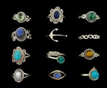 Twelve silver and stone set silver rings including malachite