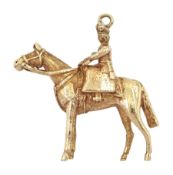 9ct gold lady on horseback pendant/charm