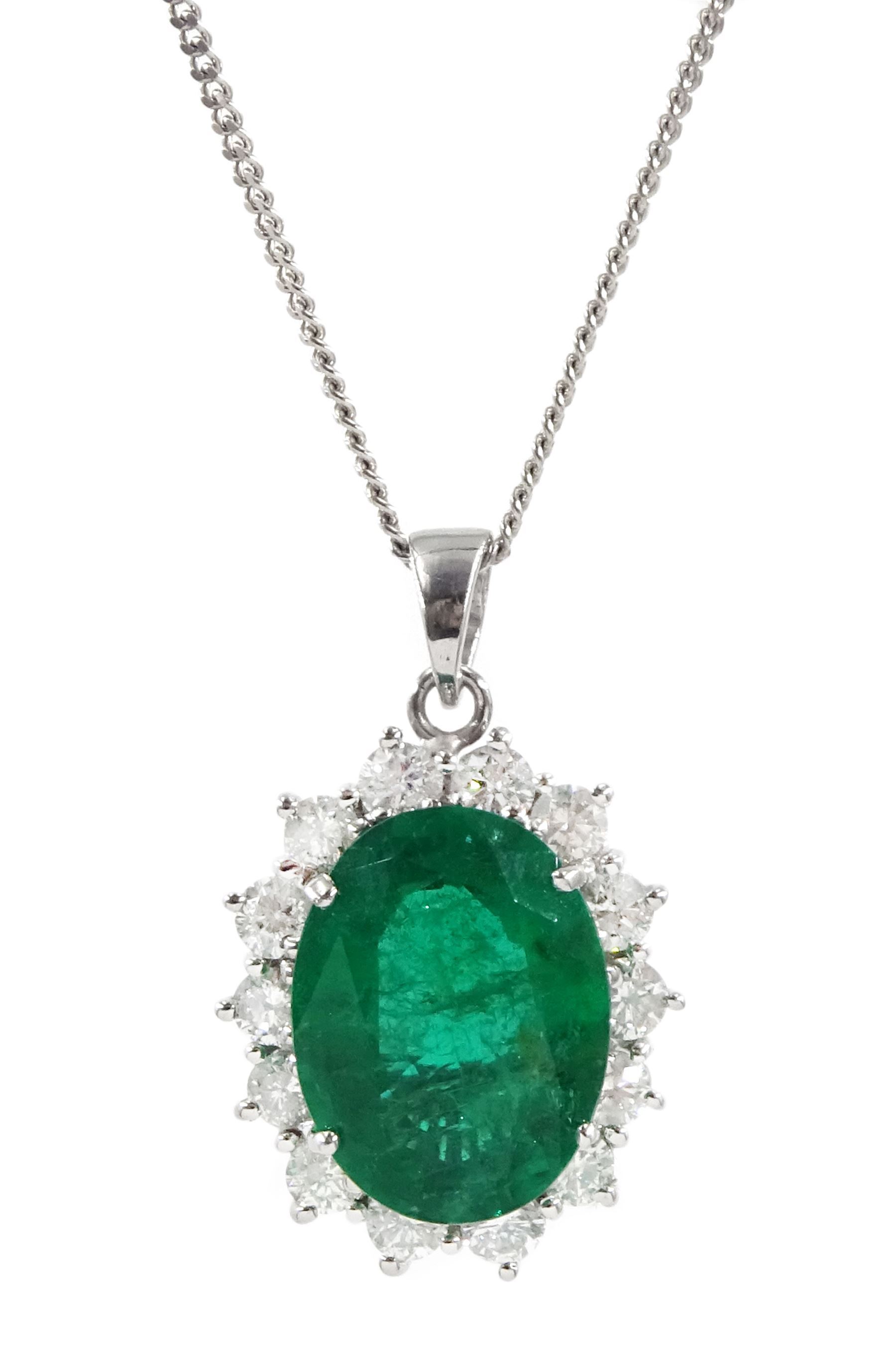 18ct white gold oval emerald and round brilliant cut diamond pendant necklace