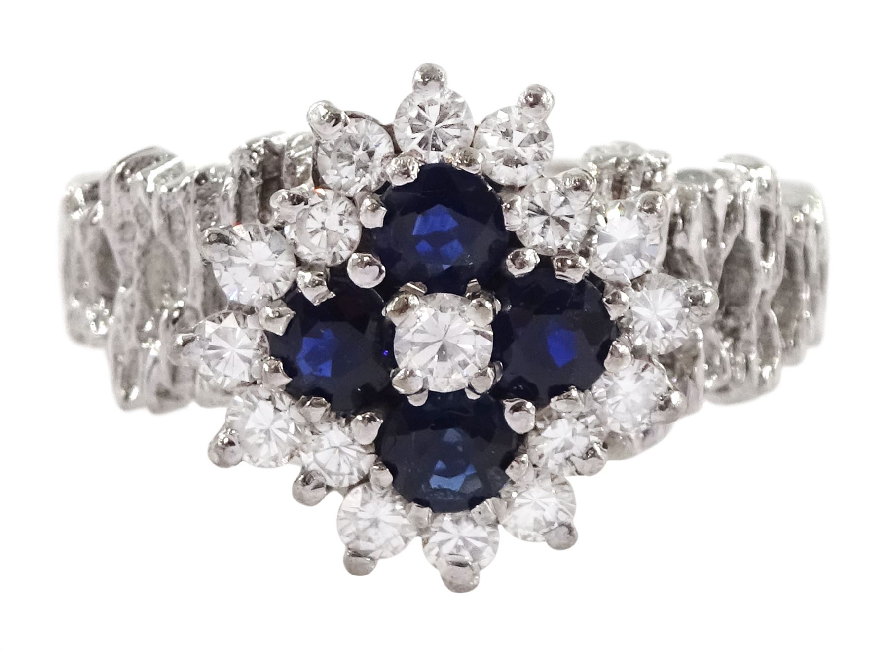 White gold sapphire and round brilliant cut diamond cluster ring