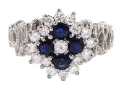 White gold sapphire and round brilliant cut diamond cluster ring