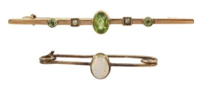 Early 20th century gold peridot and seed pearl brooch and a gold single stone opal brooch