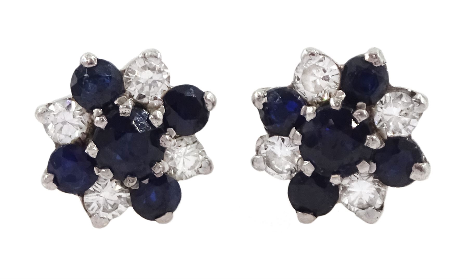 Pair of 18ct gold sapphire and round brilliant cut diamond cluster stud earrings