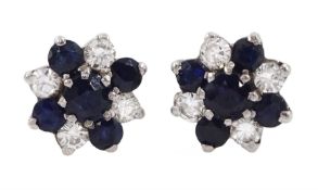 Pair of 18ct gold sapphire and round brilliant cut diamond cluster stud earrings