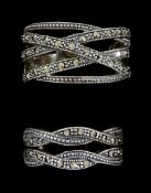 Two silver marcasite crossover rings