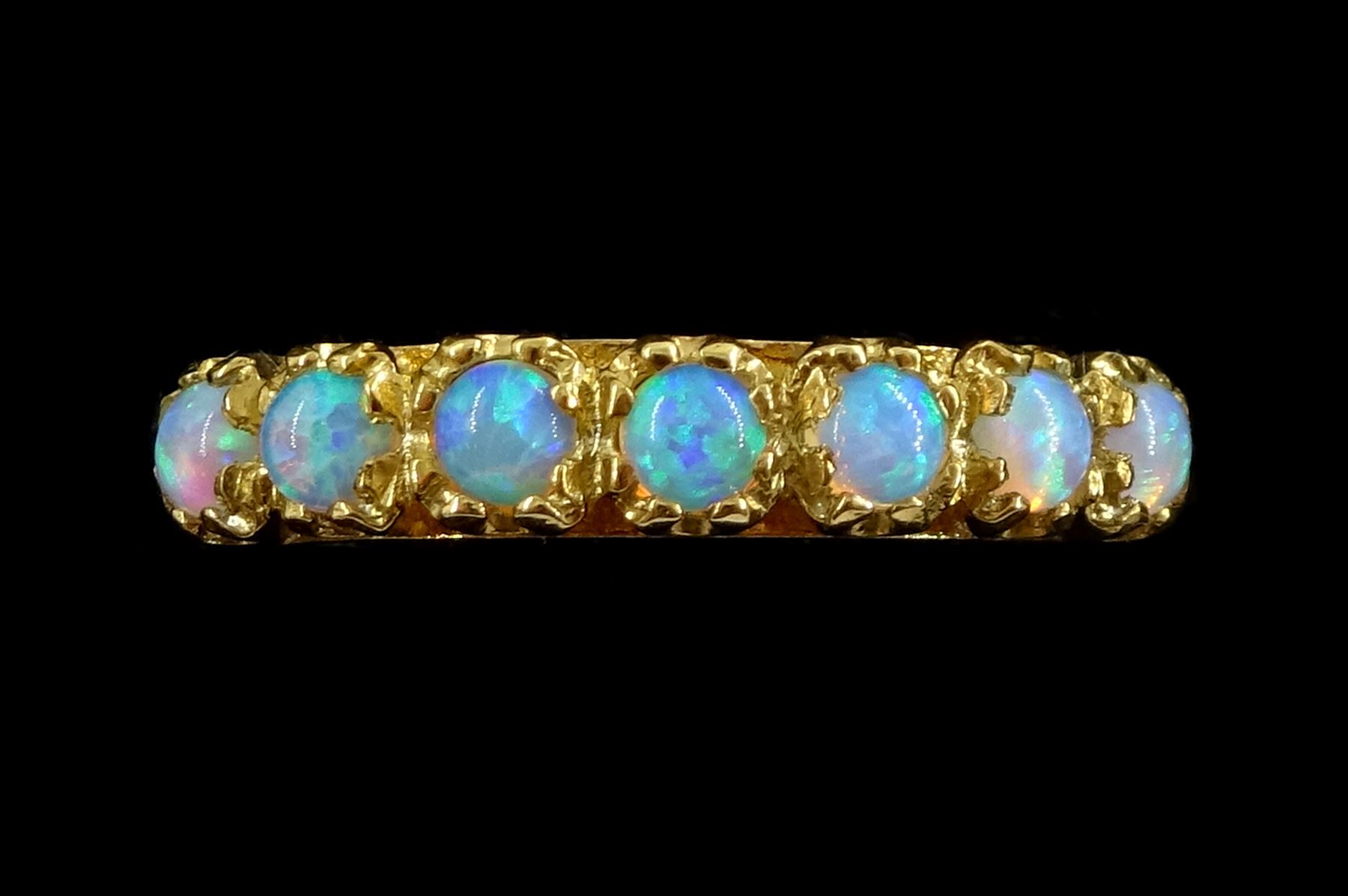 Silver-gilt seven stone opal ring