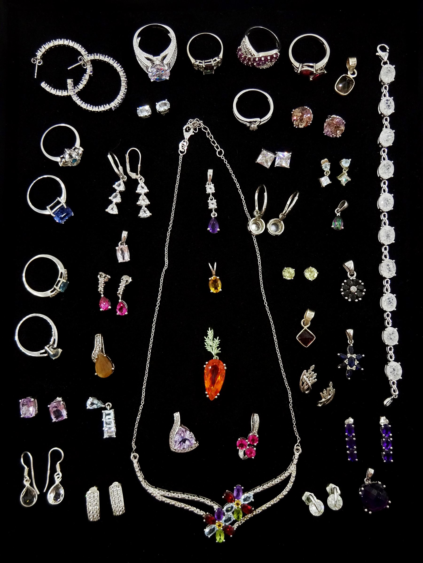 Collection of stone set silver jewellery including rings