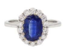18ct white gold oval cut kyanite and round brilliant cut diamond cluster ring