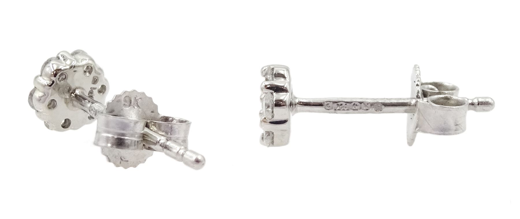 Pair of platinum round brilliant cut diamond flower cluster stud earrings - Image 2 of 2