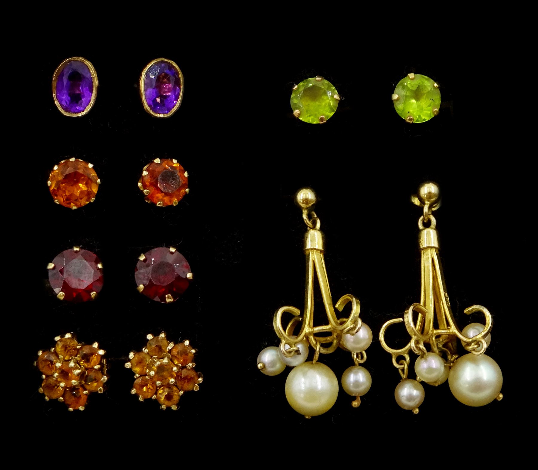 Six pairs of 9ct gold stud earrings including pearl