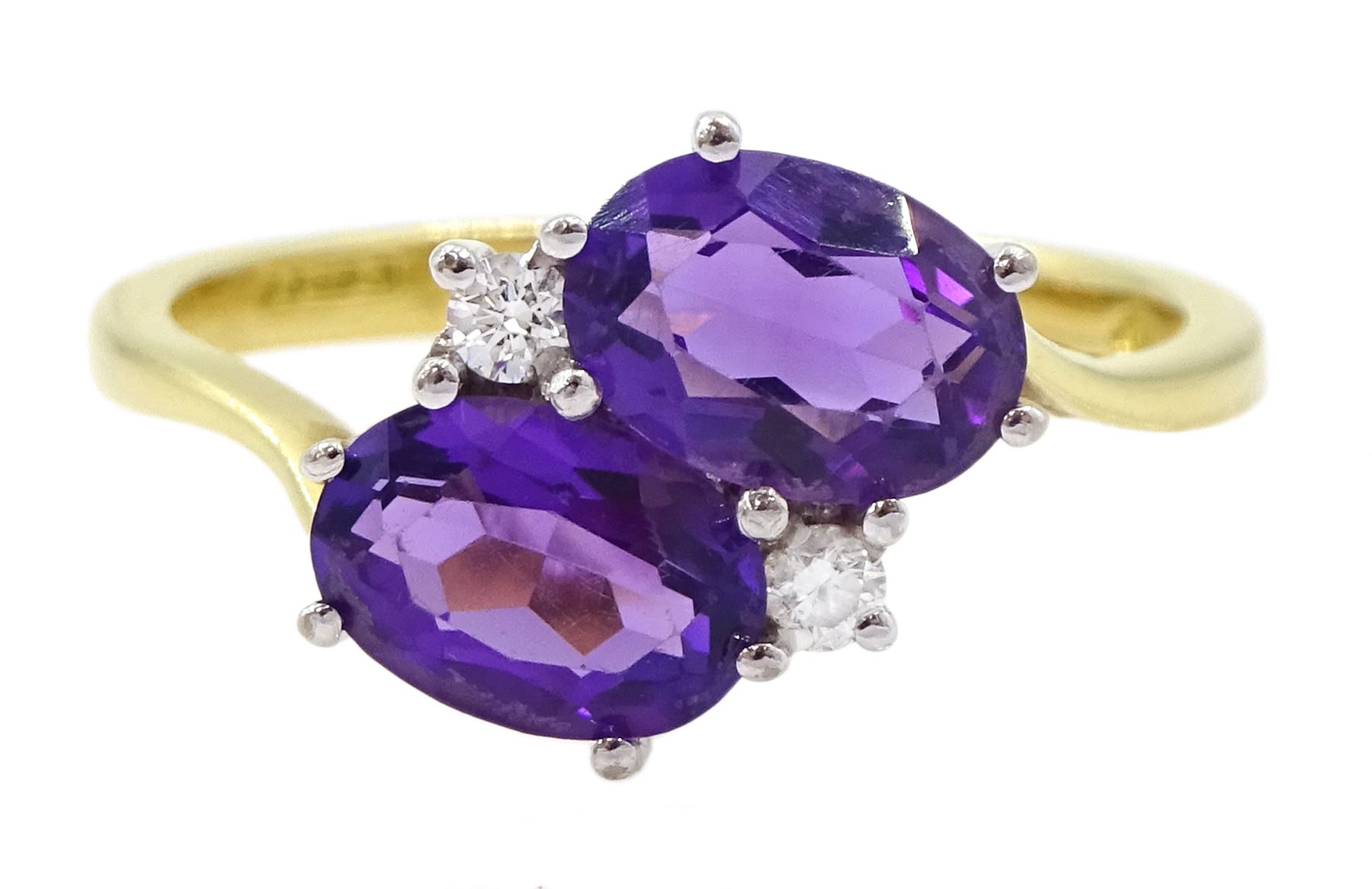 18ct gold four stone oval cut amethyst and round brilliant cut diamond ring