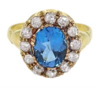 18ct gold oval blue topaz and old cut diamond cluster ring