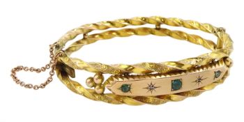 Edwardian 9ct gold green stone and diamond chip hinged bangle