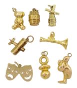 Three 18ct gold charms including teddy bear