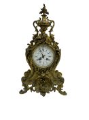 French - late 19th century 8-day gilt brass mantle clock surmounted by an urn