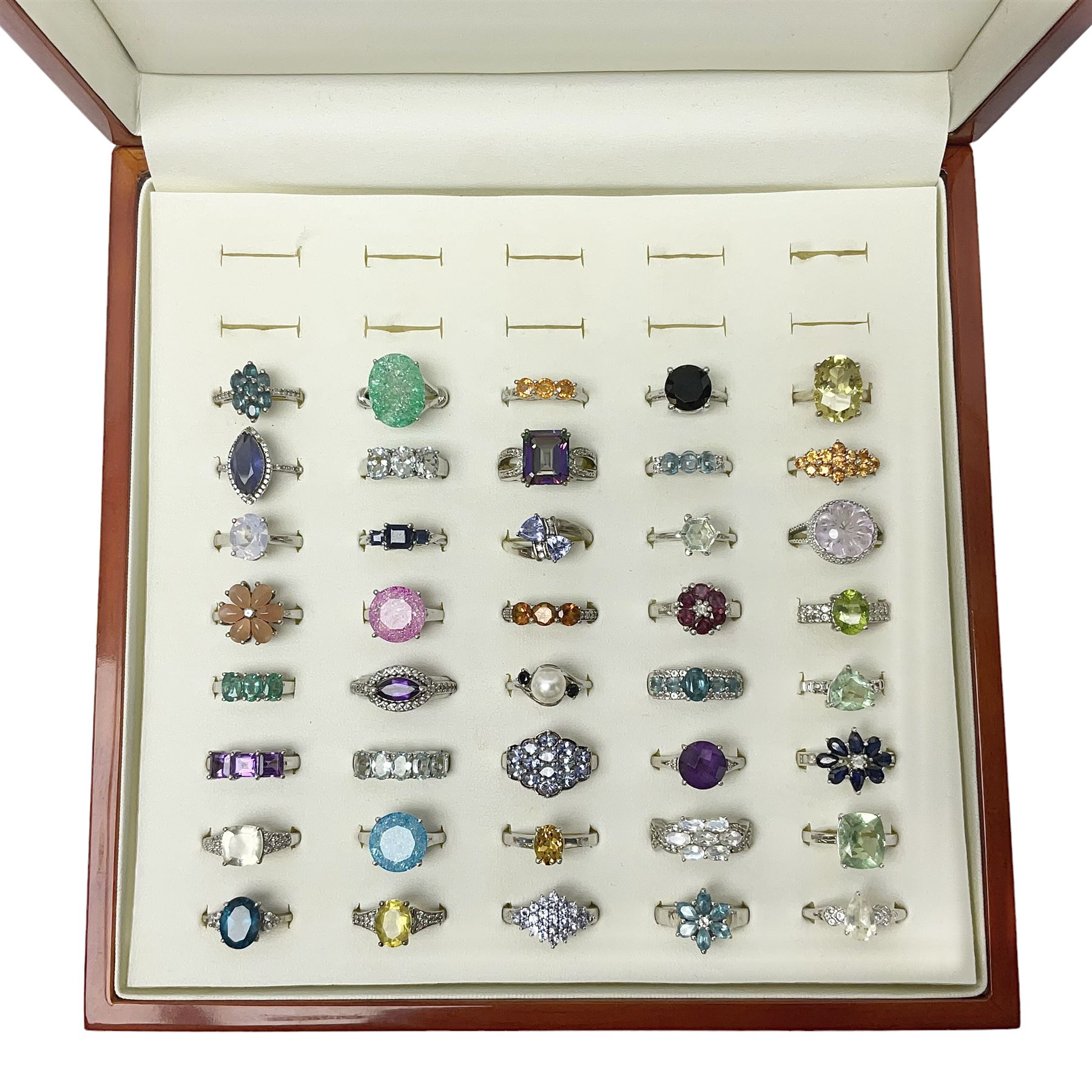 Forty silver stone-set rings including topaz