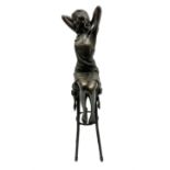 Art Deco style bronze modelled as a female figure seated upon a chair