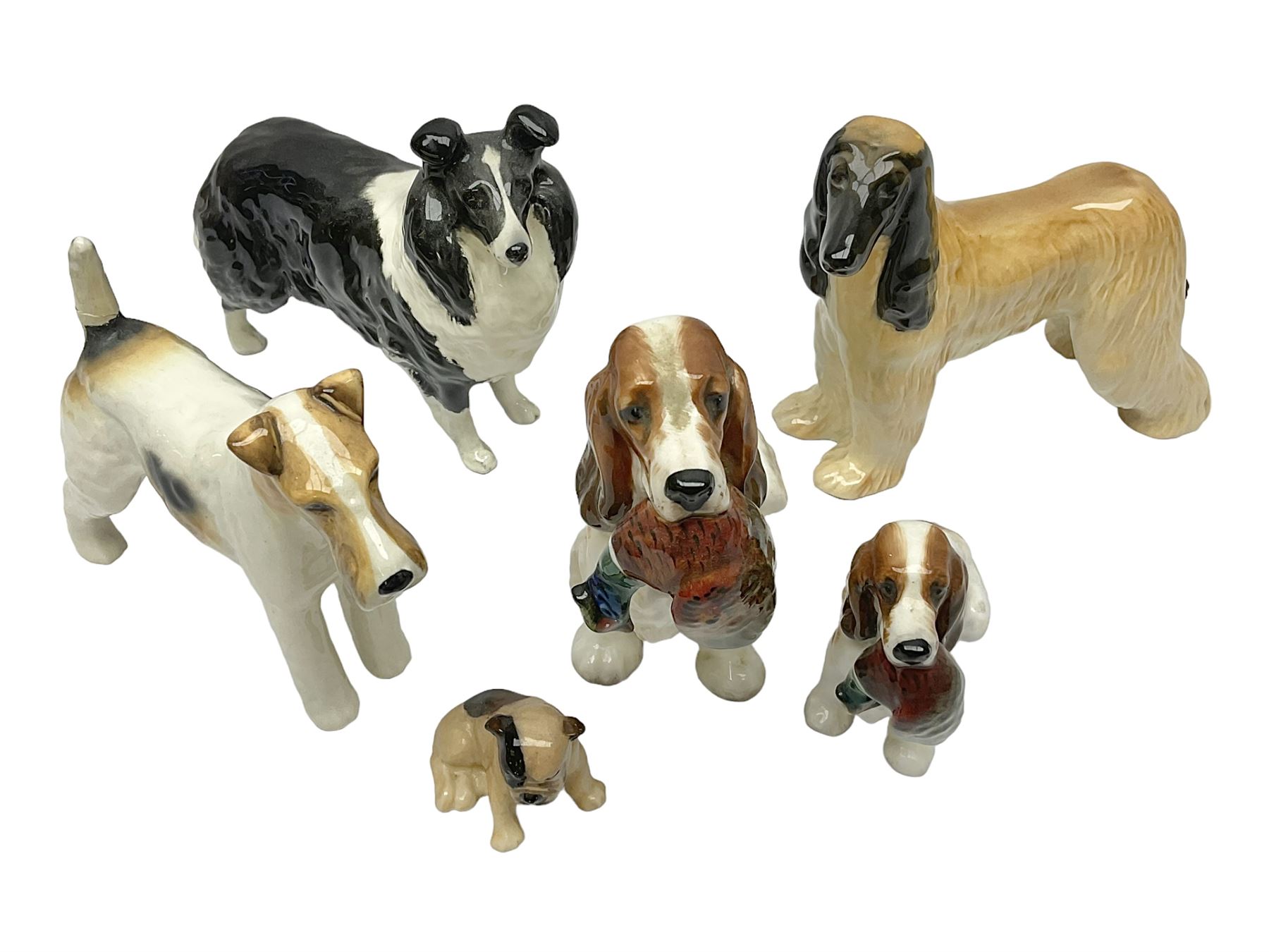 Three Beswick dog figures