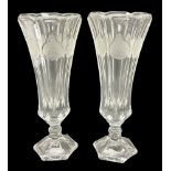 Pair of American depression glass flute shaped vases each of pedestal form moulded with the patrioti