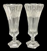 Pair of American depression glass flute shaped vases each of pedestal form moulded with the patrioti