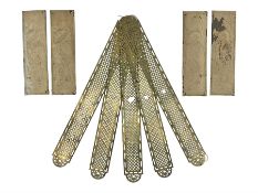 Set of five brass pierced door plates