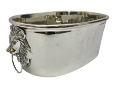 Contemporary plated ice bucket with lion mask handles