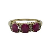 9ct gold three stone oval ruby and cubic zirconia ring