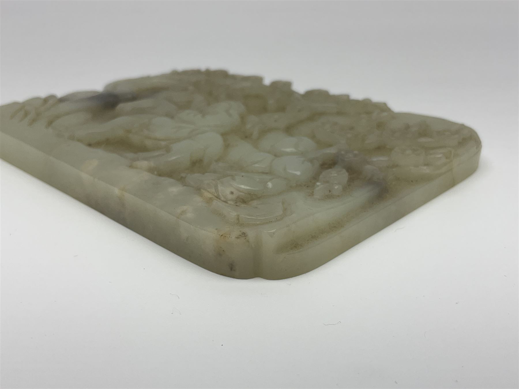 Pale celadon jade plaque carved in one side with a man riding his horse underneath flowering trees - Image 6 of 8