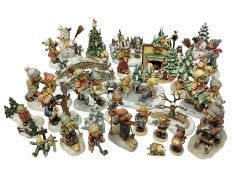 Large collection of Christmas themed Hummel figures and Hummel scapes by Goebel