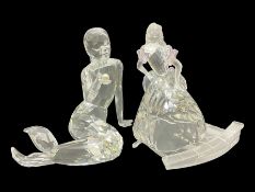 Two Swarovski figures