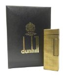 Dunhill gold plated lighter with engine turned decoration