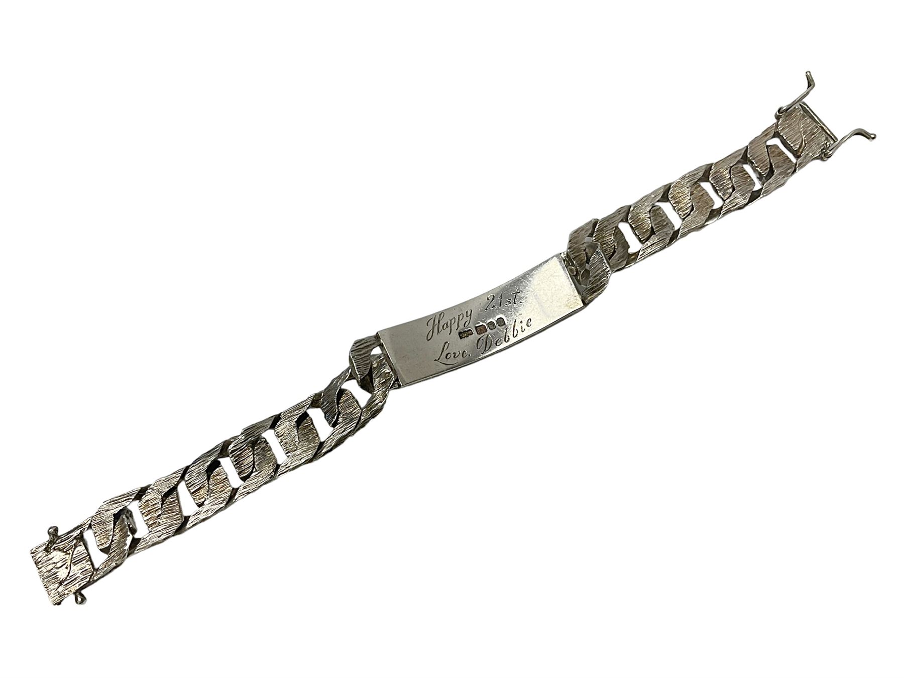 Heavy silver curb link identity bracelet