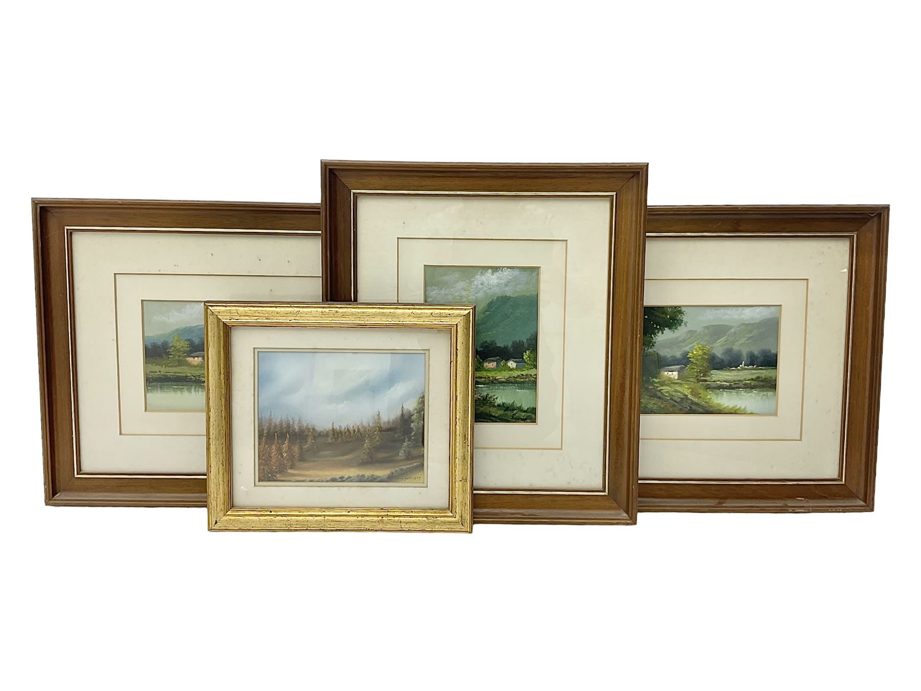 Four framed oil paintings of landscapes