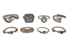 Eight silver and silver-gilt stone set rings