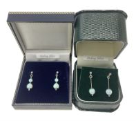 Two pairs of silver opal pendant earrings