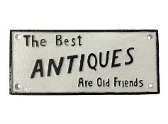 Cast iron sign 'The Best Antiques Are Old Friends'