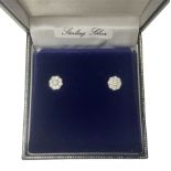 Pair of silver cubic zirconia daisy cluster stud earrings