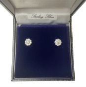 Pair of silver cubic zirconia daisy cluster stud earrings