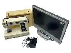 SONY KDL-S23A12A2U television with remote; and a JANOME NEW HOME electric sewing machine